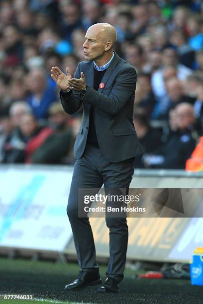 Bob Bradley, Manager of Swansea City gives team instructions during the Premier League match between Swansea City and Watford at the Liberty Stadium...