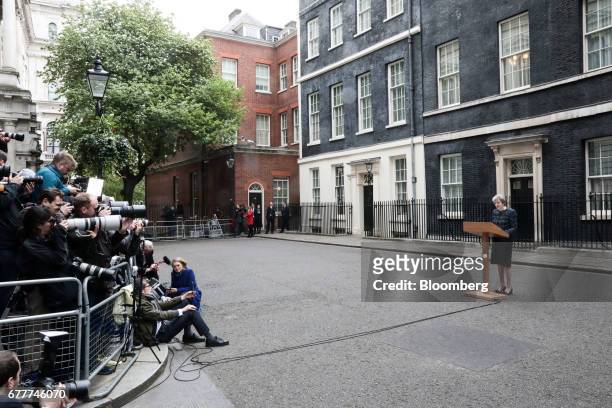 Theresa May, U.K. Prime minister, makes a statement to the media outside number 10 Downing Street after meeting Queen Elizabeth II to mark the...