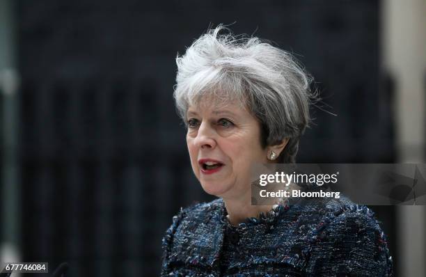 Theresa May, U.K. Prime minister, makes a statement to the media outside number 10 Downing Street after meeting Queen Elizabeth II to mark the...