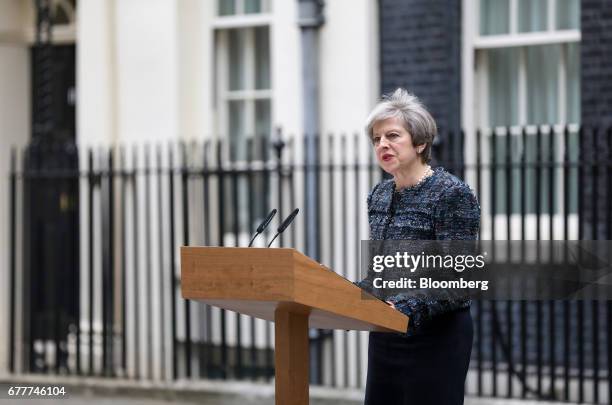 Theresa May, U.K. Prime minister, makes a statement to the media outside number 10 Downing Street after meeting Queen Elizabeth II to mark the...