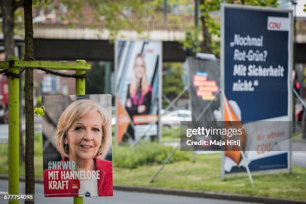 Election campaign billboards of the German Social Democrats and the German Christian Democrats are seen ahead of state elections in North...