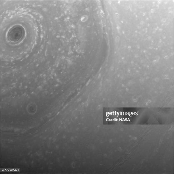 In this handout image provided by the National Aeronautics and Space Administration , the hexagon-shaped jet stream around the planet's north pole is...