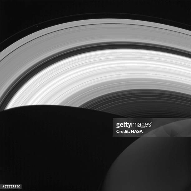 In this handout image provided by the National Aeronautics and Space Administration , NASA's Cassini spacecraft looks down at the rings of Saturn...