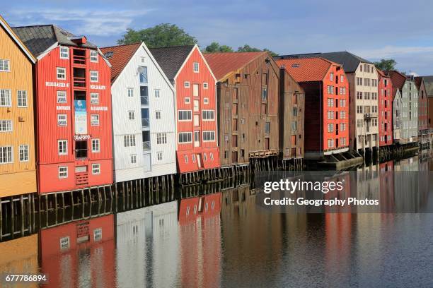 Historic waterside warehouse buildings on River Nidelva, Bryggene, Trondheim, Norway.