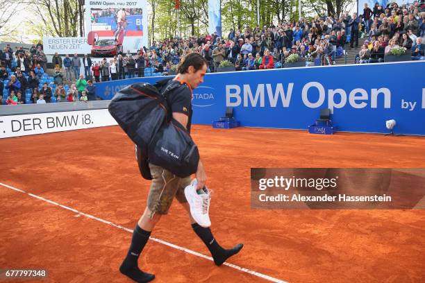 Tommy Haas of Germany leaves the centre court in a tradiotional Bavarian leather pants after his 2. Round match against Jan-Lennard Sruff of Germany...