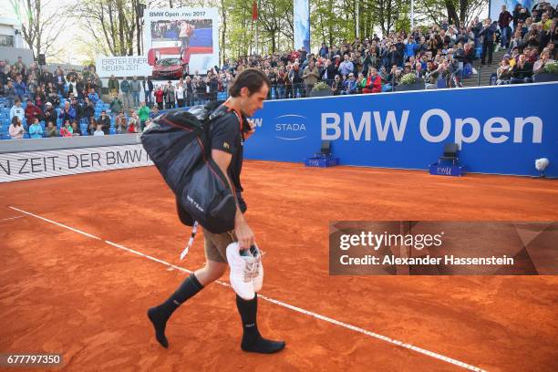 Tommy Haas of Germany leaves the centre court in a tradiotional Bavarian leather pants after his 2. Round match against Jan-Lennard Sruff of Germany...