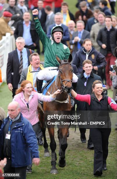 Jockey Colman Sweeney celebrates winning the Christie's Foxhunter Chase Challenge Cup on Salsify, on Gold Cup Day, during the Cheltenham Festival.