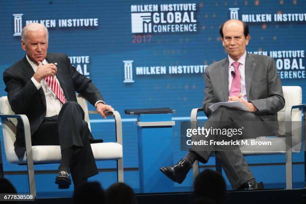 Former U.S. Vice President Joe Biden and Chairman of the Milken Institute Michael Milken speak during the Milken Institute Global Conference 2017 at...