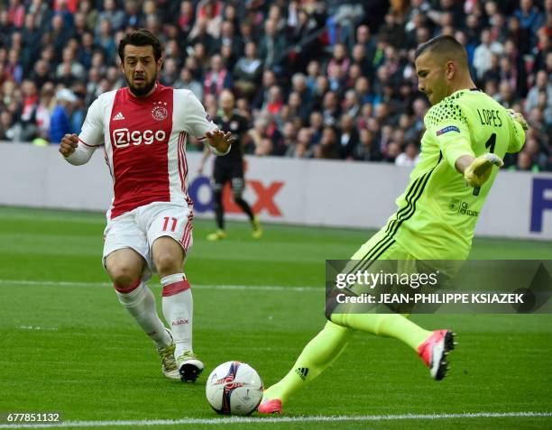 Ajax forward Amin Younes vies with Lyon's French-Portuguese defender Anthony Lopes during UEFA Europa League semi-final, first leg, Ajax Amsterdam v...