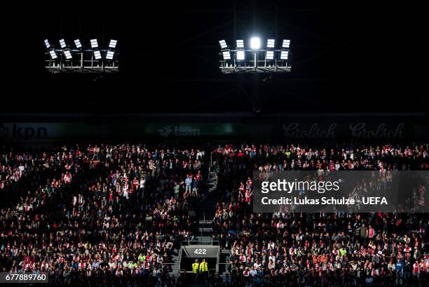 Fans are lit by the sun during the Uefa Europa League, semi final first leg match, between Ajax Amsterdam and Olympique Lyonnais at Amsterdam Arena...
