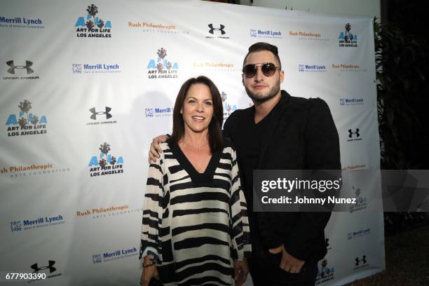 Susan Kantor and Dot attend the 2nd Annual Art For Life Los Angeles at a private residence on May 2, 2017 in West Hollywood, California.