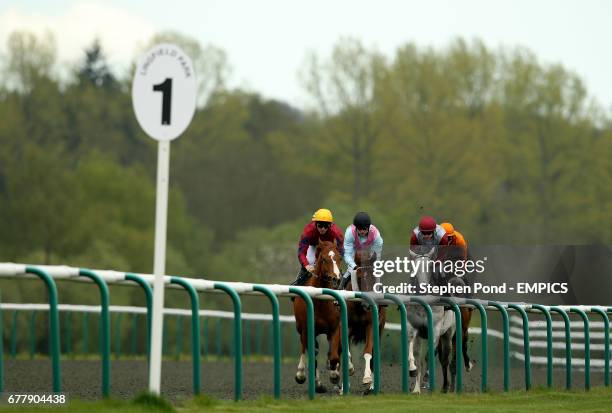 Eagle Nebula ridden by jockey Ian Mongan leads to go on and win the Lingfield Park Owners Club Selling Stakes at Lingfield Park Racecourse
