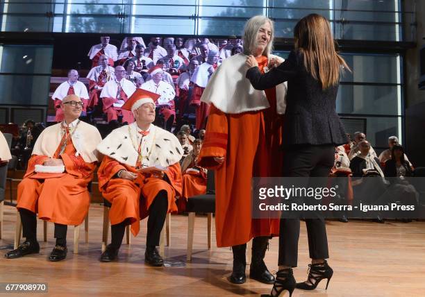 Loris Borghi, the Rector of the Parma's University confers to American musician and authoress Patti Smith an honorary degree in Literature at...