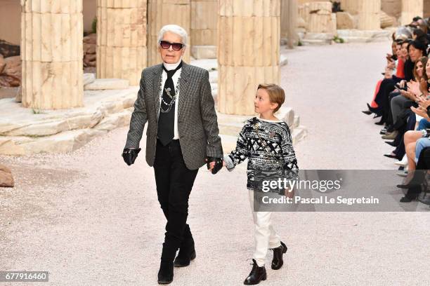 Designer Karl Lagerfeld and nephew Hudson Kroenig walk the runway during Chanel Cruise 2017/2018 Collection at Grand Palais on May 3, 2017 in Paris,...