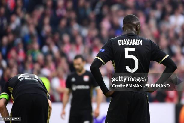 Lyon's defender Mouctar Diakhaby reacts during UEFA Europa League semi-final, first leg, Ajax Amsterdam v Olympique Lyonnais on May 3, 2017 in...