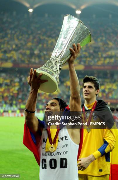 Atletico Madrid's Falcao celebrates winning the 2012 UEFA Europa League Final with the trophy