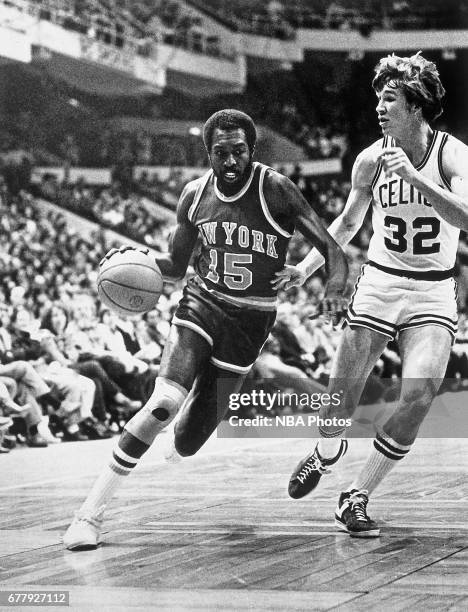 Earl Monroe of the New York Knicks dribbles against the Boston Celtics circa 1975 at the Boston Garden in Boston, Massachussetts. NOTE TO USER: User...