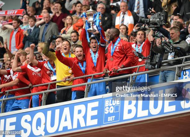 York City's captain Chris Smith lifts the trophy after winning The Blue Square Bet premier Division Promotion Final