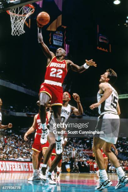Clyde Drexler of the Houston Rockets shoots against the San Antonio Spurs during Game One of the Western Conference Finals on May 22, 1995 at the...