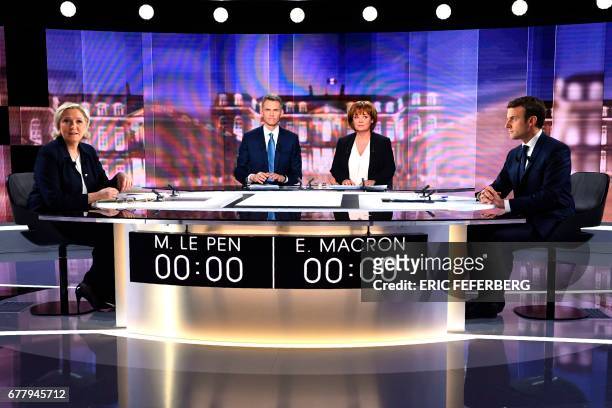 French presidential election candidate for the far-right Front National party, Marine Le Pen, French journalist Christophe Jakubyszyn, French...