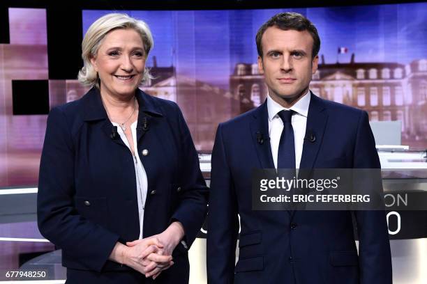 French presidential election candidate for the far-right Front National party, Marine Le Pen and French presidential election candidate for the En...