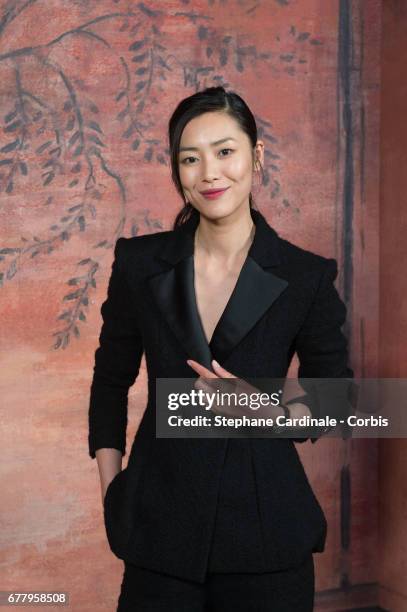 Liu Wen attends the Chanel Cruise 2017/2018 Collection : Photocall at Grand Palais on May 3, 2017 in Paris, France.