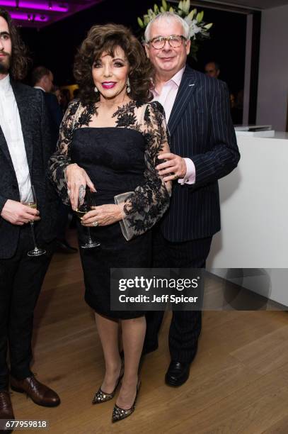 Joan Collins and Christopher Biggins attend as auction house hosts champagne reception to preview a selection of the 1000-lot estate of the late...