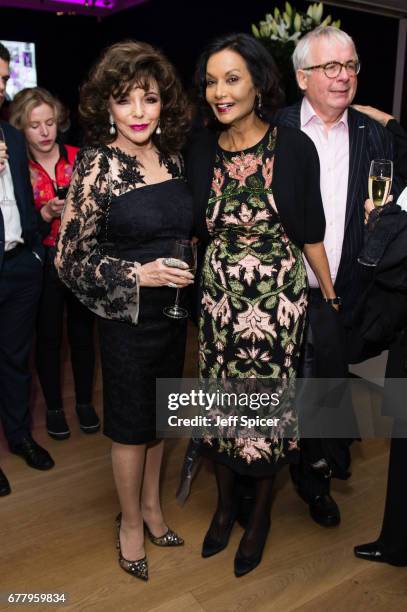 Joan Collins and Shakira Caine attend as auction house hosts champagne reception to preview a selection of the 1000-lot estate of the late author...