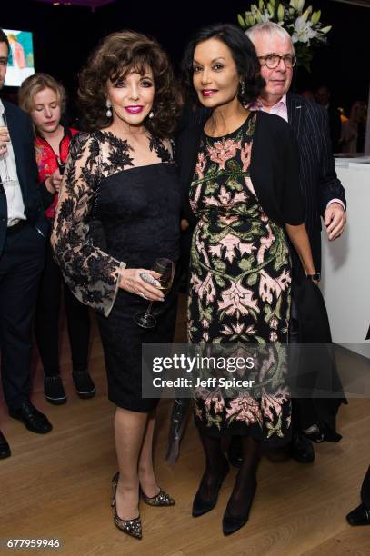 Joan Collins and Shakira Caine attend as auction house hosts champagne reception to preview a selection of the 1000-lot estate of the late author...