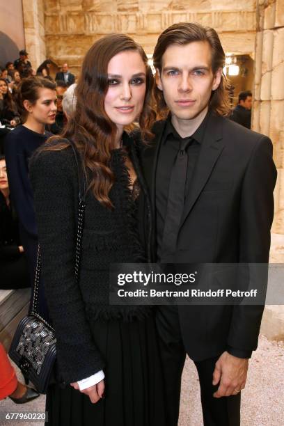 Actress Keira Knightley and her husband musician James Righton attend the Chanel Cruise 2017/2018 Collection Show at Grand Palais on May 3, 2017 in...