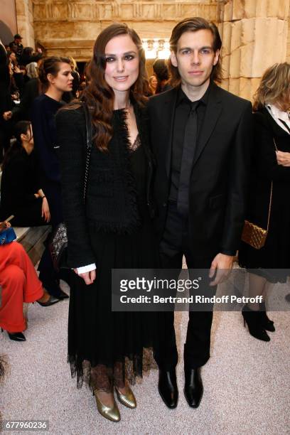 Actress Keira Knightley and her husband musician James Righton attend the Chanel Cruise 2017/2018 Collection Show at Grand Palais on May 3, 2017 in...