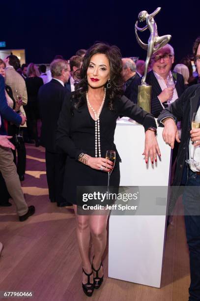 Nancy Dell'Olio attends as auction house hosts champagne reception to preview a selection of the 1000-lot estate of the late author Jackie Collins...