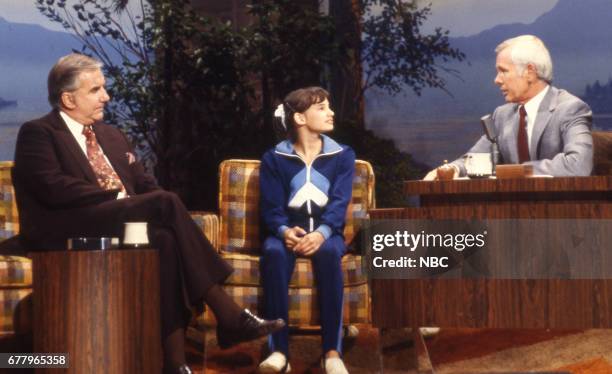 Pictured: Announcer Ed McMahon, Gymnast Tracee Talavera during an interview with host Johnny Carson on August 10, 1979 --