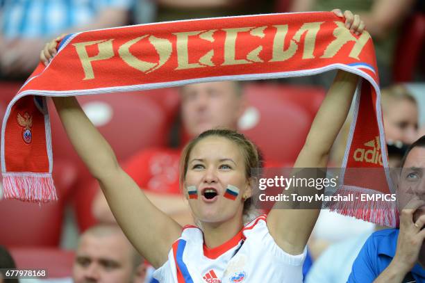 Russia fan in the crowd before the match