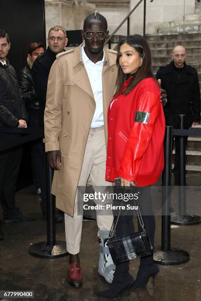 Footballer Mamadou Sakho and his wife Majda arrives at the Chanel Cruise 2017/2018 Collection at Grand Palais on May 3, 2017 in Paris, France.