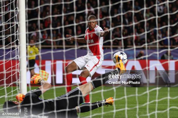 Monaco forward Kylian Mbappe shoots the ball and Juventus goalkeeper Gianluigi Buffon dives for the ball during the Uefa Champions League semi finals...