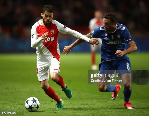 Bernardo Silva of AS Monaco and Claudio Marchisio of Juventus in action during the UEFA Champions League Semi Final first leg match between AS Monaco...