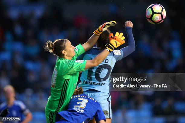 Ann-Katrin Berger of Birmingham City Ladies challenges Carli Lloyd of Manchester City Women for a high ball during the WSL 1 match between Manchester...