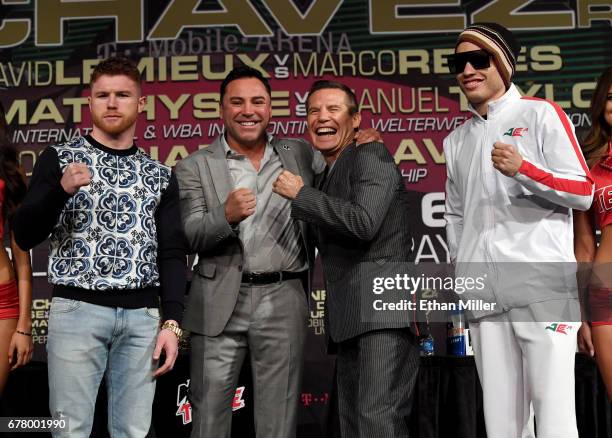 Boxer Canelo Alvarez, Golden Boy Promotions Chairman and CEO Oscar De La Hoya, former boxer Julio Cesar Chavez Sr. And his son, boxer Julio Cesar...