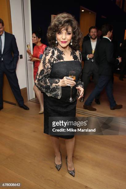 Joan Collins attends as auction house hosts champagne reception to preview a selection of the 1000-lot estate of the late author Jackie Collins ahead...