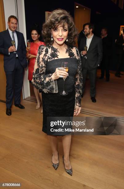 Joan Collins attends as auction house hosts champagne reception to preview a selection of the 1000-lot estate of the late author Jackie Collins ahead...