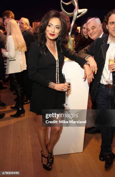 Nancy Dell'Olio attends as auction house hosts champagne reception to preview a selection of the 1000-lot estate of the late author Jackie Collins...