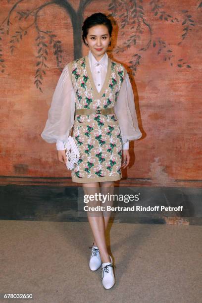 Liu Shishi attends the Chanel Cruise 2017/2018 Collection Show at Grand Palais on May 3, 2017 in Paris, France.