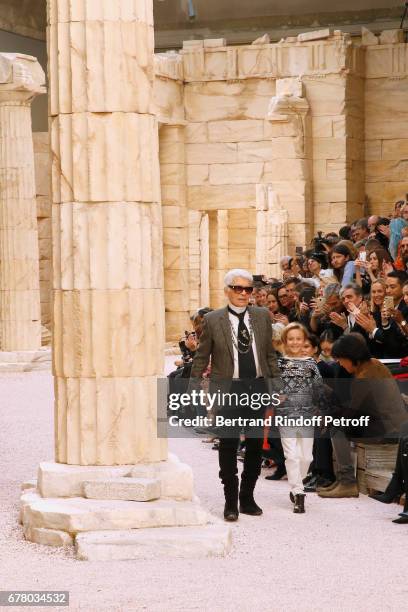 Stylist Karl Lagerfeld and his nephew Hudson Kroenig walk the runway during the Chanel Cruise 2017/2018 Collection Show at Grand Palais on May 3,...