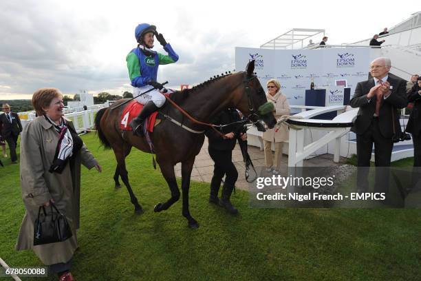 Epsom Salts ridden by jockey Serena Brotherton is lead into the winner's enclosure after winning the May Family Ladies' Derby Handicap