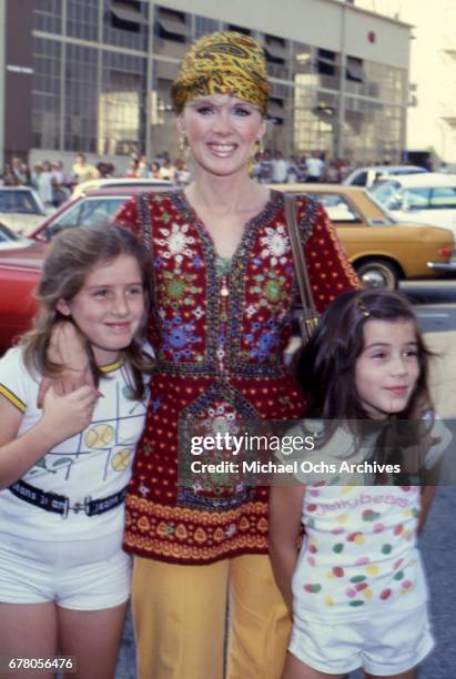 Actress Connie Stevens attends an event with her daughters Joely Fisher and Tricia Leigh Fisher in circa 1974.