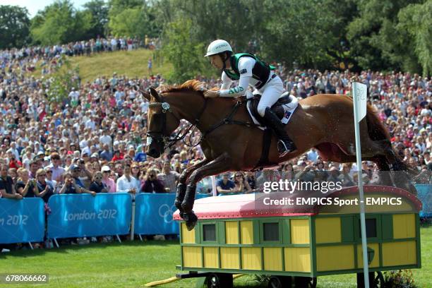 Australia's Christopher Burton riidng HP Leilani on the Cross Country Course during the Eventing at Greenwich Park, on the third day of the London...