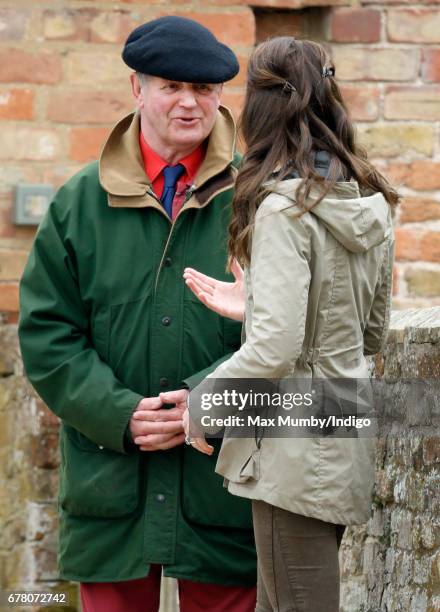 Michael Morpurgo accompanies Catherine, Duchess of Cambridge as she visits Farms for City Children on May 3, 2017 in Arlingham, England. Farms for...