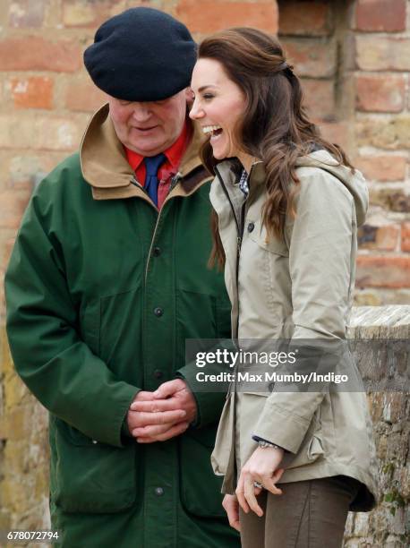 Michael Morpurgo accompanies Catherine, Duchess of Cambridge as she visits Farms for City Children on May 3, 2017 in Arlingham, England. Farms for...