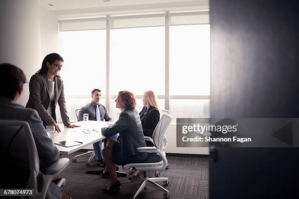 women colleagues talking in meeting room - open day 5 stock pictures, royalty-free photos & images